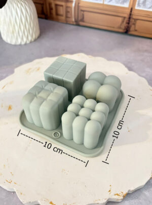 Fabricado en silicona de alta flexibilidad y resistencia térmica, esta plantilla presenta múltiples cavidades de cubos de burbujas en formato miniatura. Es ideal para la elaboración de pequeñas velas decorativas, ceras aromáticas para quemador (wax melts), jabones de glicerina o figuras en resina y yeso con un acabado geométrico definido y vanguardista.